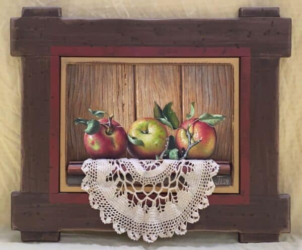 Umetnička slika Tri jabuke slikar Jovica Tomašević - tehnika ulje na platnu kasirano na speru - format slike sa ramom 41x50 cm - bez rama 22x30 cm - Cena umetničke slike 23600 dinara - izgled slike sa ramom