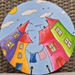 Umetnička slika Sušenje veša – slikarka Tijana Lazić – tehnika slikanja akril na okruglom platnu – prečnik slike 30 cm – cena umetničke slike 5.900 dinara – sertifikat – izgled slike bez rama Umetnička slika Sušenje veša – slikarka Tijana Lazić – tehnika slikanja akril na okruglom platnu – prečnik slike 30 cm – cena umetničke slike 5.900 dinara – sertifikat – izgled slike bez rama